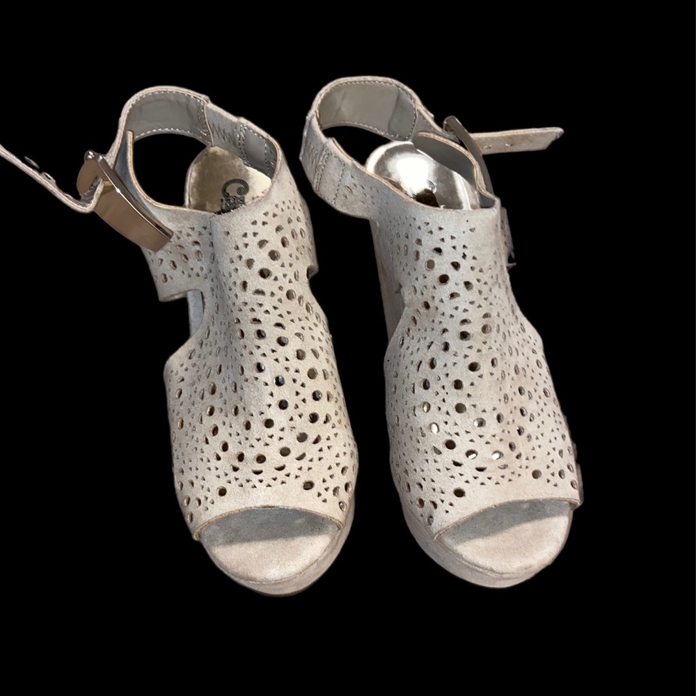 Carlos Santana wedges